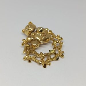 Broche vintage ours au cou articulé en métal doré