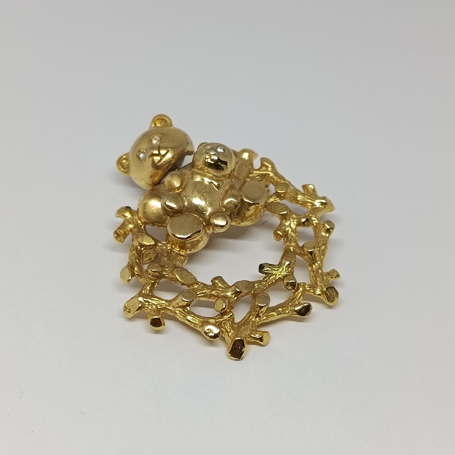 Broche vintage ours au cou articulé en métal doré